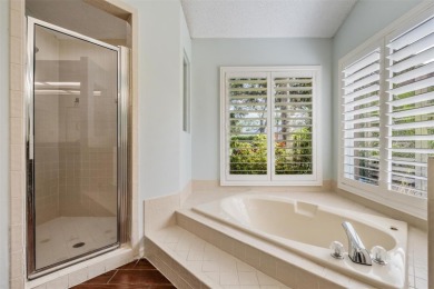 Single-Story 5-Bedroom Pool Home in Hunter's Green Golf on Hunters Green Country Club in Florida - for sale on GolfHomes.com, golf home, golf lot