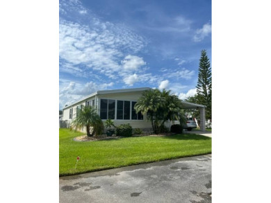 Welcome to this stunning and spacious home located in The on Hamptons Golf Club in Florida - for sale on GolfHomes.com, golf home, golf lot