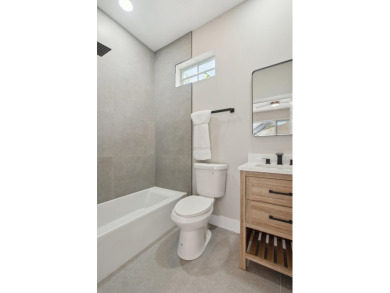 Resort style living - this completely renovated home sits on Indian River Club in Florida - for sale on GolfHomes.com, golf home, golf lot