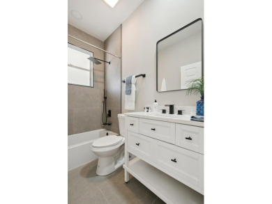 Resort style living - this completely renovated home sits on Indian River Club in Florida - for sale on GolfHomes.com, golf home, golf lot