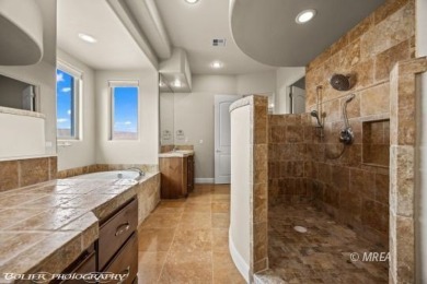 Envelop yourself in luxury. Located in the beautiful gated on Falcon Ridge Golf Course in Nevada - for sale on GolfHomes.com, golf home, golf lot