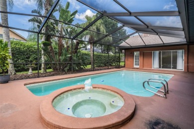 Single-Story 5-Bedroom Pool Home in Hunter's Green Golf on Hunters Green Country Club in Florida - for sale on GolfHomes.com, golf home, golf lot