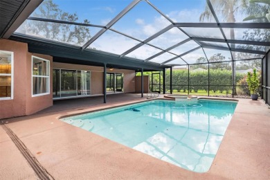 Single-Story 5-Bedroom Pool Home in Hunter's Green Golf on Hunters Green Country Club in Florida - for sale on GolfHomes.com, golf home, golf lot