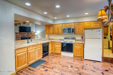 Perfectly located upper-level 3-bedroom, 2-bath condo in Sports on Pinetop Lakes Golf and Country Club in Arizona - for sale on GolfHomes.com, golf home, golf lot