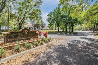 Single-Story 5-Bedroom Pool Home in Hunter's Green Golf on Hunters Green Country Club in Florida - for sale on GolfHomes.com, golf home, golf lot