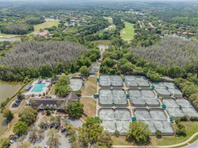Single-Story 5-Bedroom Pool Home in Hunter's Green Golf on Hunters Green Country Club in Florida - for sale on GolfHomes.com, golf home, golf lot