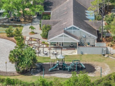 Single-Story 5-Bedroom Pool Home in Hunter's Green Golf on Hunters Green Country Club in Florida - for sale on GolfHomes.com, golf home, golf lot