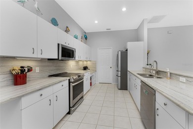 BEST PRICED POOL HOME WITH A 3 CAR GARAGE IN ROTONDA! And it's on Pinemoor West Golf Club in Florida - for sale on GolfHomes.com, golf home, golf lot