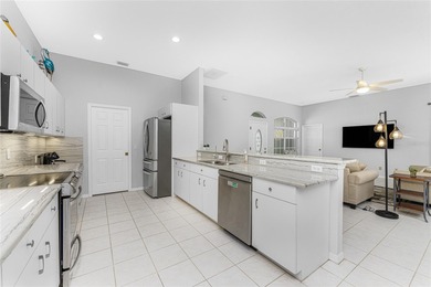 BEST PRICED POOL HOME WITH A 3 CAR GARAGE IN ROTONDA! And it's on Pinemoor West Golf Club in Florida - for sale on GolfHomes.com, golf home, golf lot