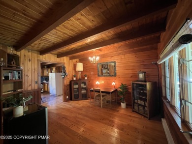 Immaculate Log Cabin in Pocono Farms Country Club Association - on Pocono Farms Country Club in Pennsylvania - for sale on GolfHomes.com, golf home, golf lot