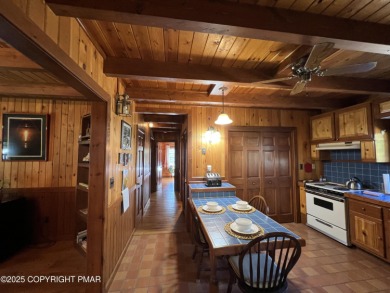 Immaculate Log Cabin in Pocono Farms Country Club Association - on Pocono Farms Country Club in Pennsylvania - for sale on GolfHomes.com, golf home, golf lot