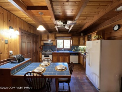 Immaculate Log Cabin in Pocono Farms Country Club Association - on Pocono Farms Country Club in Pennsylvania - for sale on GolfHomes.com, golf home, golf lot