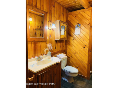 Immaculate Log Cabin in Pocono Farms Country Club Association - on Pocono Farms Country Club in Pennsylvania - for sale on GolfHomes.com, golf home, golf lot