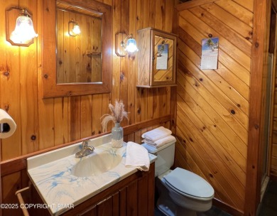 Immaculate Log Cabin in Pocono Farms Country Club Association - on Pocono Farms Country Club in Pennsylvania - for sale on GolfHomes.com, golf home, golf lot