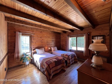 Immaculate Log Cabin in Pocono Farms Country Club Association - on Pocono Farms Country Club in Pennsylvania - for sale on GolfHomes.com, golf home, golf lot