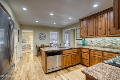 Set among towering pines on a private 0.31-acre corner lot, this on Pinetop Lakes Golf and Country Club in Arizona - for sale on GolfHomes.com, golf home, golf lot