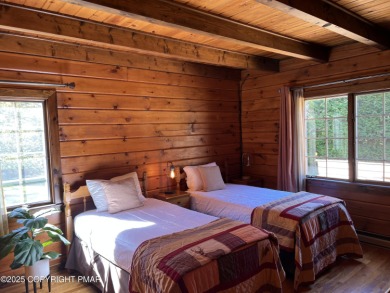 Immaculate Log Cabin in Pocono Farms Country Club Association - on Pocono Farms Country Club in Pennsylvania - for sale on GolfHomes.com, golf home, golf lot