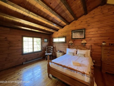 Immaculate Log Cabin in Pocono Farms Country Club Association - on Pocono Farms Country Club in Pennsylvania - for sale on GolfHomes.com, golf home, golf lot