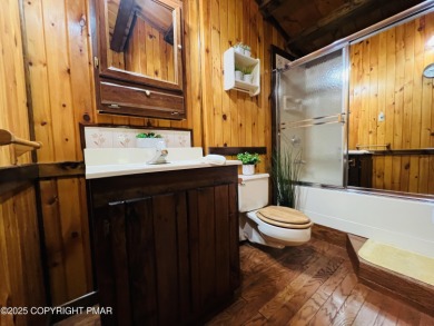 Immaculate Log Cabin in Pocono Farms Country Club Association - on Pocono Farms Country Club in Pennsylvania - for sale on GolfHomes.com, golf home, golf lot