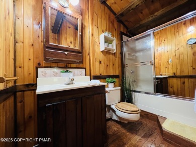 Immaculate Log Cabin in Pocono Farms Country Club Association - on Pocono Farms Country Club in Pennsylvania - for sale on GolfHomes.com, golf home, golf lot