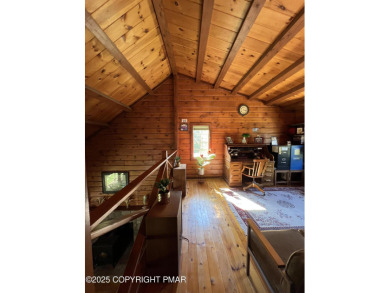Immaculate Log Cabin in Pocono Farms Country Club Association - on Pocono Farms Country Club in Pennsylvania - for sale on GolfHomes.com, golf home, golf lot