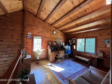 Immaculate Log Cabin in Pocono Farms Country Club Association - on Pocono Farms Country Club in Pennsylvania - for sale on GolfHomes.com, golf home, golf lot