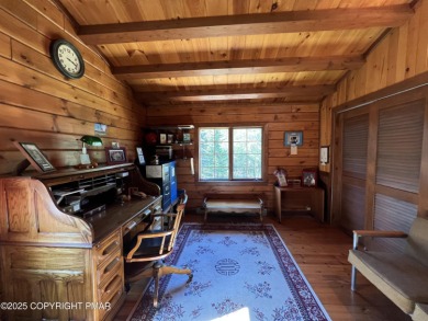 Immaculate Log Cabin in Pocono Farms Country Club Association - on Pocono Farms Country Club in Pennsylvania - for sale on GolfHomes.com, golf home, golf lot