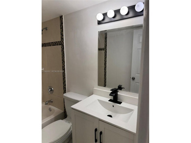 Great 3 bedrooms /2 bath, with 1124 sqft, great layout. Ceramic on Pine Island Ridge Country Club in Florida - for sale on GolfHomes.com, golf home, golf lot