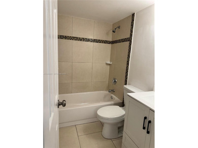 Great 3 bedrooms /2 bath, with 1124 sqft, great layout. Ceramic on Pine Island Ridge Country Club in Florida - for sale on GolfHomes.com, golf home, golf lot