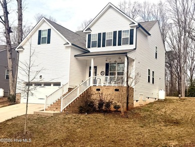 Welcome home to beautiful living in Lake Royale! This spacious on River Golf and Country Club at Lake Royale in North Carolina - for sale on GolfHomes.com, golf home, golf lot