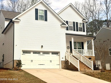 Welcome home to beautiful living in Lake Royale! This spacious on River Golf and Country Club at Lake Royale in North Carolina - for sale on GolfHomes.com, golf home, golf lot