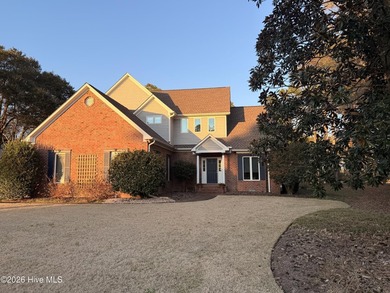 Enjoy relaxed coastal living in this 3-bedroom, 2.5-bath home on North Shore Country Club in North Carolina - for sale on GolfHomes.com, golf home, golf lot