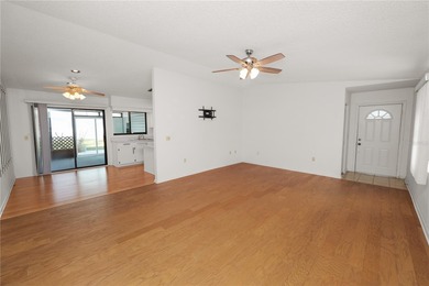 Welcome to this well maintained 2 bedroom, 2 bath home located on Highland Fairways Golf Club in Florida - for sale on GolfHomes.com, golf home, golf lot