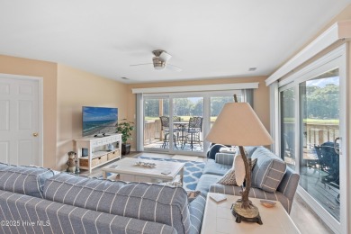 Expansive golf and water views abound in this spacious condo on Oyster Bay Golf Links in North Carolina - for sale on GolfHomes.com, golf home, golf lot