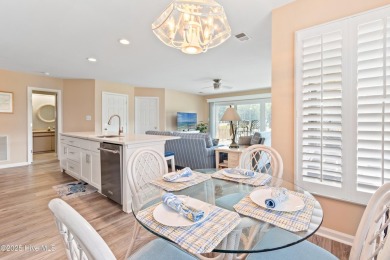 Expansive golf and water views abound in this spacious condo on Oyster Bay Golf Links in North Carolina - for sale on GolfHomes.com, golf home, golf lot