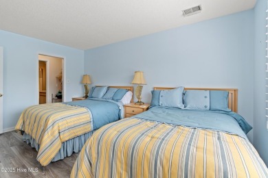 Expansive golf and water views abound in this spacious condo on Oyster Bay Golf Links in North Carolina - for sale on GolfHomes.com, golf home, golf lot