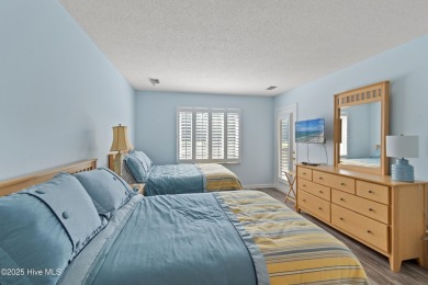 Expansive golf and water views abound in this spacious condo on Oyster Bay Golf Links in North Carolina - for sale on GolfHomes.com, golf home, golf lot