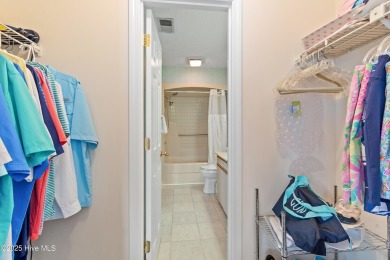 Expansive golf and water views abound in this spacious condo on Oyster Bay Golf Links in North Carolina - for sale on GolfHomes.com, golf home, golf lot