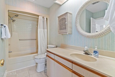 Expansive golf and water views abound in this spacious condo on Oyster Bay Golf Links in North Carolina - for sale on GolfHomes.com, golf home, golf lot