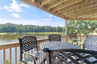 Expansive golf and water views abound in this spacious condo on Oyster Bay Golf Links in North Carolina - for sale on GolfHomes.com, golf home, golf lot