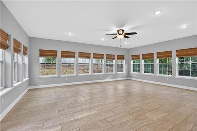 Tucked inside the gated, resort-style community of Fairfield on Fairfield Plantation Golf and Country Club in Georgia - for sale on GolfHomes.com, golf home, golf lot