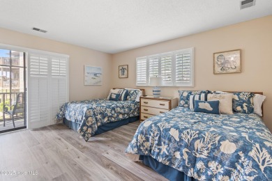 Expansive golf and water views abound in this spacious condo on Oyster Bay Golf Links in North Carolina - for sale on GolfHomes.com, golf home, golf lot