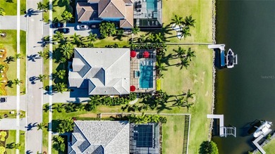 851 Manns Harbor Drive | 5 Bed | 5 Bath | 100+ Ft Waterfront | on Apollo Beach Golf and Sea Club in Florida - for sale on GolfHomes.com, golf home, golf lot