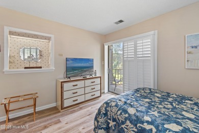 Expansive golf and water views abound in this spacious condo on Oyster Bay Golf Links in North Carolina - for sale on GolfHomes.com, golf home, golf lot