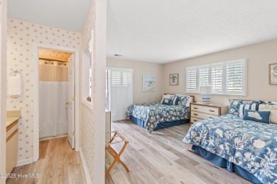 Expansive golf and water views abound in this spacious condo on Oyster Bay Golf Links in North Carolina - for sale on GolfHomes.com, golf home, golf lot