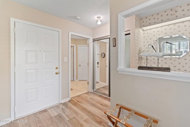 Expansive golf and water views abound in this spacious condo on Oyster Bay Golf Links in North Carolina - for sale on GolfHomes.com, golf home, golf lot
