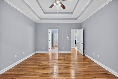 Tucked inside the gated, resort-style community of Fairfield on Fairfield Plantation Golf and Country Club in Georgia - for sale on GolfHomes.com, golf home, golf lot