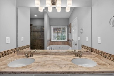 Tucked inside the gated, resort-style community of Fairfield on Fairfield Plantation Golf and Country Club in Georgia - for sale on GolfHomes.com, golf home, golf lot