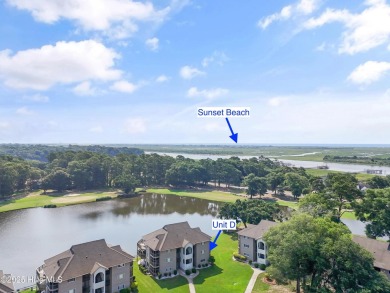 Expansive golf and water views abound in this spacious condo on Oyster Bay Golf Links in North Carolina - for sale on GolfHomes.com, golf home, golf lot