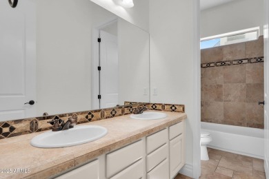Located behind the gates of the prestigious Seville Golf & on Seville Golf and Country Club in Arizona - for sale on GolfHomes.com, golf home, golf lot